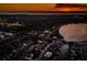 Sunset aerial view of residential area with a mix of homes, canals, and lakefront property at 315 Manatee Ln, Tarpon Springs, FL 34689