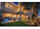 Home's well-maintained backyard offers a relaxing retreat, complete with a large patio at 315 Manatee Ln, Tarpon Springs, FL 34689