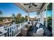 Beautiful waterfront balcony with seating area, perfect for relaxing and enjoying the view at 315 Manatee Ln, Tarpon Springs, FL 34689