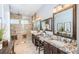 Spacious bathroom featuring double sinks, granite countertops, and a glass shower at 315 Manatee Ln, Tarpon Springs, FL 34689