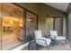 Relaxing screened-in patio with comfortable seating and a view into the well-lit interior rooms at 318 Parkside Ln, Safety Harbor, FL 34695