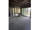 Image of basement during home construction with sliding glass doors at 329 Medallion Blvd # C, Madeira Beach, FL 33708