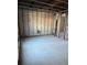 Unfinished basement with concrete flooring at 329 Medallion Blvd # C, Madeira Beach, FL 33708