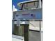 Close up on Hi-Tide boat lift mechanism with American Flag Sticker at 329 Medallion Blvd # C, Madeira Beach, FL 33708
