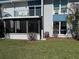 Image of a condo with a screened in patio and balcony at 329 Medallion Blvd # C, Madeira Beach, FL 33708