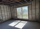 Unfinished room with a large window, showcasing water views and natural light at 329 Medallion Blvd # C, Madeira Beach, FL 33708