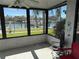 Enclosed porch with marina views, ideal for relaxing and enjoying waterfront living at 329 Medallion Blvd # C, Madeira Beach, FL 33708