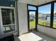 Screened-in patio overlooking the marina, complete with ceiling fan at 329 Medallion Blvd # C, Madeira Beach, FL 33708