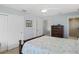 Bedroom featuring tile floors and ensuite bathroom at 330 176Th Avenue Cir, Redington Shores, FL 33708