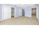 Bedroom featuring tile floors, ceiling fan and closet at 330 176Th Avenue Cir, Redington Shores, FL 33708