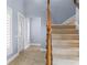 Welcoming foyer featuring a staircase, tile flooring, natural light, and neutral wall color at 330 176Th Avenue Cir, Redington Shores, FL 33708