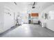 Garage featuring washer/dryer and storage at 330 176Th Avenue Cir, Redington Shores, FL 33708