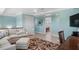 Living room featuring seating and decorative rug at 330 176Th Avenue Cir, Redington Shores, FL 33708
