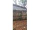 Backyard view, with wooden fence and foliage at 3718 19Th S Ave, St Petersburg, FL 33711