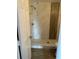Bathroom with marble tile surround, shower head, and tile flooring at 3718 19Th S Ave, St Petersburg, FL 33711
