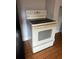 Kitchen stove with glass top, oven and tiled floor at 3718 19Th S Ave, St Petersburg, FL 33711