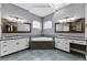 Bright bathroom with double vanity sinks, granite countertops, and a soaking tub at 37350 Neighbors Path, Zephyrhills, FL 33542