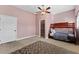 Cozy bedroom with bunkbeds, a large window, and a closet space at 37350 Neighbors Path, Zephyrhills, FL 33542