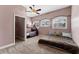 Bedroom with a bunkbed, many windows with blinds, and a closet at 37350 Neighbors Path, Zephyrhills, FL 33542