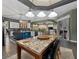 Open concept dining room adjacent to kitchen and living area at 37350 Neighbors Path, Zephyrhills, FL 33542