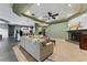 Living room with open floor plan, fireplace and lots of natural light at 37350 Neighbors Path, Zephyrhills, FL 33542