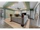 Living room with a fireplace and access to an outdoor space at 37350 Neighbors Path, Zephyrhills, FL 33542
