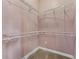 This is a view of the wire shelves of the walk-in closet and pink walls at 37350 Neighbors Path, Zephyrhills, FL 33542