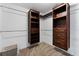 Well-organized closet with custom shelving and hanging rods for optimal storage at 37350 Neighbors Path, Zephyrhills, FL 33542