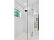 Modern bathroom with glass shower and white tile at 4308 W Beach Park Dr, Tampa, FL 33609