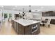 Gourmet kitchen boasts a large island, stainless steel appliances, and an open floor plan perfect for entertaining at 4308 W Beach Park Dr, Tampa, FL 33609