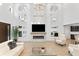 Stunning living room with fireplace, marble accent wall and high ceilings at 4308 W Beach Park Dr, Tampa, FL 33609