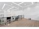 Loft area highlighting an open floor plan with contemporary lighting fixtures at 4308 W Beach Park Dr, Tampa, FL 33609