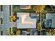 Aerial view of a house and swimming pool in a beautiful residential neighborhood at 4823 Deer Lodge Rd, New Port Richey, FL 34655