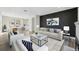 Bright living room features modern decor, stylish furnishings, and wood-look floors at 502 W Hanna Ave, Tampa, FL 33604