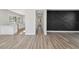 Open floor plan from the kitchen, down the hall to the decorative wall at 502 W Hanna Ave, Tampa, FL 33604