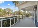 Charming front porch featuring classic white railings and a view of the street at 502 W Hanna Ave, Tampa, FL 33604