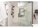 Beautiful bathroom featuring frameless glass shower door, white subway tile, and a marble tile shower floor at 5441 Worthington Loop, Palm Harbor, FL 34685