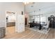 Bright dining room with backyard views, opens to a modern kitchen, and connects seamlessly to the living space at 5441 Worthington Loop, Palm Harbor, FL 34685