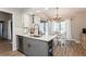 This kitchen features stainless steel appliances, granite counters, a wine rack, and breakfast nook at 5441 Worthington Loop, Palm Harbor, FL 34685