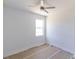 Bright bedroom featuring a modern ceiling fan and a window with natural light at 59 Mark Twain Ln, Rotonda West, FL 33947