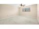 Bedroom features include neutral colored walls, carpeted floors, and natural light at 6100 Gulfport S Blvd # 310, Gulfport, FL 33707