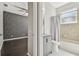 A view from the bedroom to the bathroom which features a shower and sink at 7309 Night Heron Dr, Land O Lakes, FL 34637