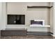 A modern fireplace with TV setup makes the perfect entertainment room centerpiece at 7309 Night Heron Dr, Land O Lakes, FL 34637