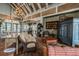 Inviting lounge area showcasing stylish furnishings, hardwood floors, and high ceilings for a relaxed atmosphere at 7309 Night Heron Dr, Land O Lakes, FL 34637