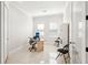 Bright office space featuring neutral colors, tile flooring, and natural lighting at 8057 Rio Bella Pl, Bradenton, FL 34201