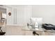 Bright office space featuring neutral colors, tile flooring, and a glass desk at 8057 Rio Bella Pl, Bradenton, FL 34201