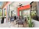 Outdoor living space with comfortable wicker furniture and a view of the pool at 8057 Rio Bella Pl, Bradenton, FL 34201