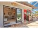 View of the outdoor patio, including a wet bar and a glimpse of the living room and pool at 8057 Rio Bella Pl, Bradenton, FL 34201
