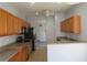 Functional kitchen featuring stainless steel appliances and ample cabinet space at 829 Lantern Way # 829, Clearwater, FL 33765