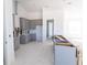 Modern kitchen featuring sleek gray cabinets, ample counter space, and an open layout awaiting final touches at 8917 Calumet Blvd, Port Charlotte, FL 33981